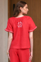 Renata Top, Red